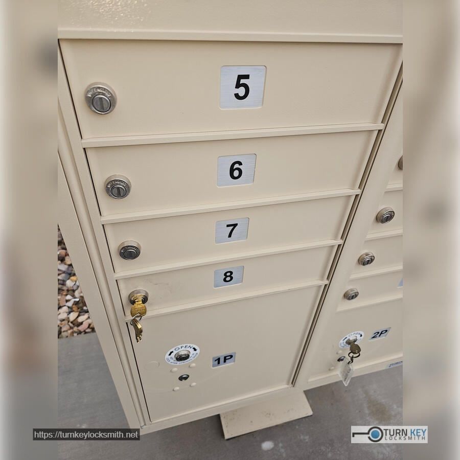 Apartment cluster mailbox with replacement mailbox lock and new keys installed at a Phoenix apartment complex in the Devonshire Manor neighborhood